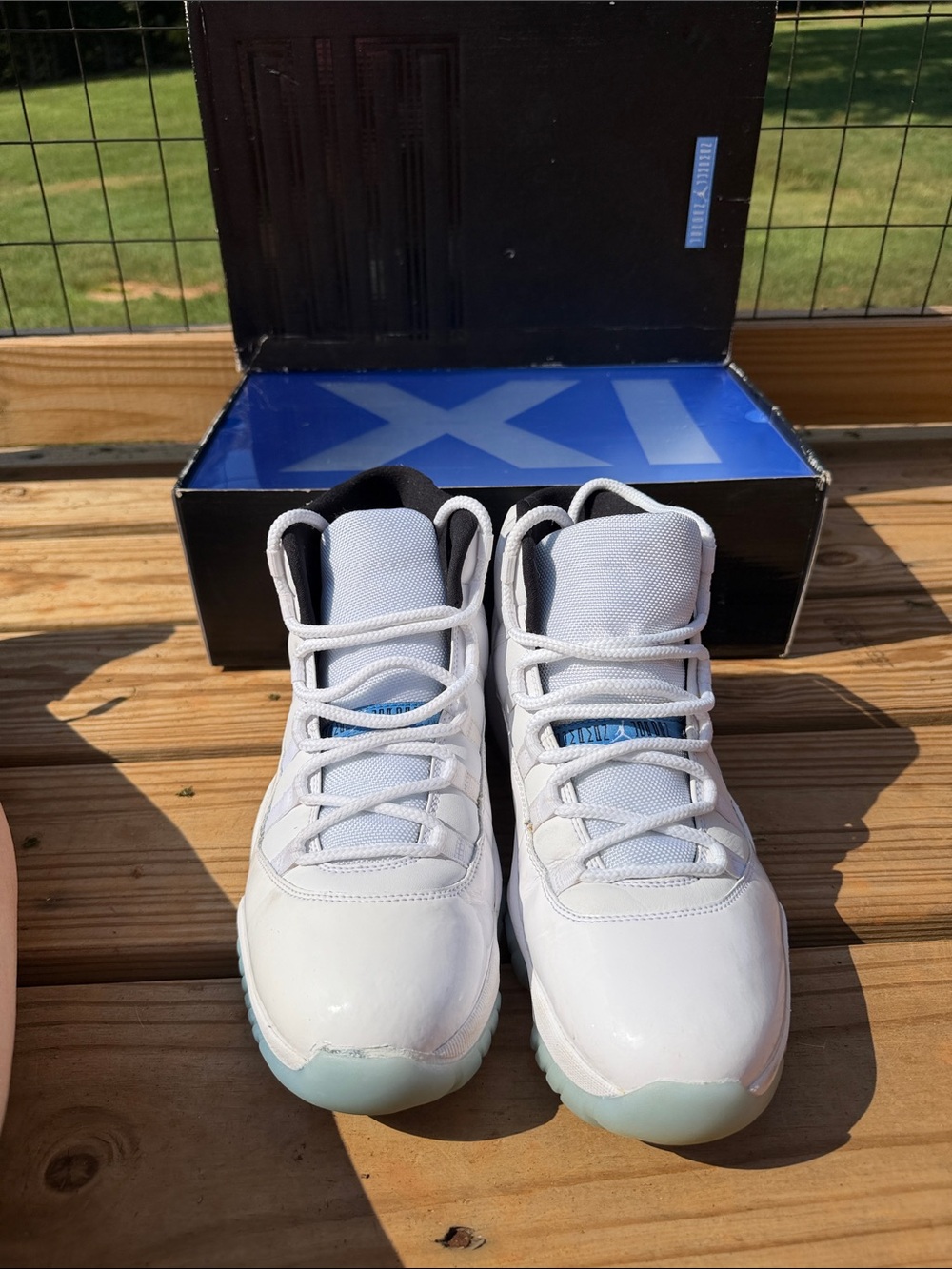 Air Jordan 11 Retro Men’s White with Light Blue Accents Sneakers